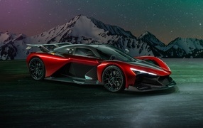 Красный спорткар Zenvo Aurora Agil  на фоне гор