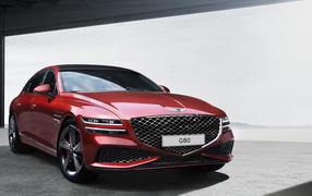 Стильный Genesis G80 Sport 2023 года вид спереди