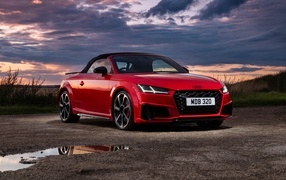 Red 2023 Audi TTS Final Edition Roadster car against the sky