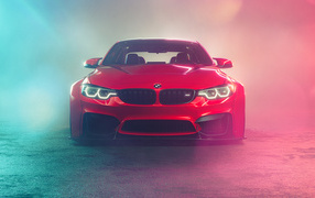 Red BMW M4 car in smoke