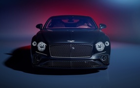 Front view of Bentley Continental GT car on blue background