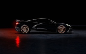 Черный автомобиль Chevrolet Corvette Zodiac 2023  года вид сбоку