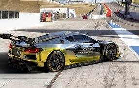 Спорткар Chevrolet Corvette Z06 GT3 R у гоночной трассы