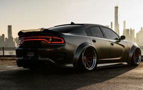 Black car Dodge Charger Hellcat Enforcer rear view
