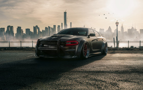 Car Dodge Charger Hellcat Enforcer on the background of the city