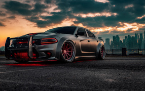 Автомобиль Dodge Charger Hellcat Enforcer  на фоне грозового неба