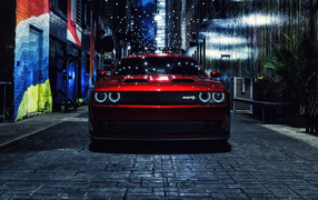 Red Dodge Challenger SRT Hellcat on a city street