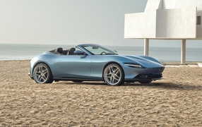 2023 Ferrari Roma Spider car stands on the sand