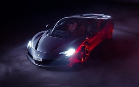 Ferrari SF90 Stradale with headlights on