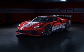 Красный быстрый автомобиль Ferrari 296 Challenge 2023 года