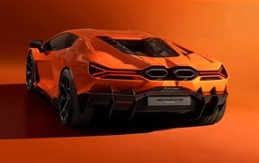2023 Lamborghini Revuelto orange car back view