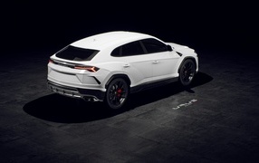 White SUV Lamborghini Urus rear view