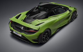 Зеленый McLaren 765LT Spider 2022 на сером фоне 