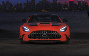 Red 2021 Mercedes-AMG GT Black Series car in front of a skyscraper