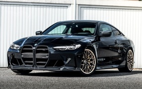 Черный автомобиль Manhart MH4 600