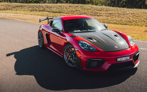 2023 Porsche 718 Cayman GT4 RS Weissach Package sports car on the road
