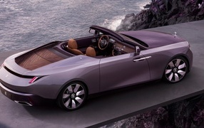Rolls-Royce Amethyst Droptail convertible by the sea