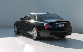 Stylish black car Rolls-Royce Ghost 2023 rear view