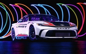2024 Toyota Camry XSE NASCAR Race Car on a colorful background