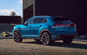 Синий Volkswagen Atlas Cross Sport 2024  вид сзади