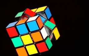 Multi-colored Rubik's cube on a black background