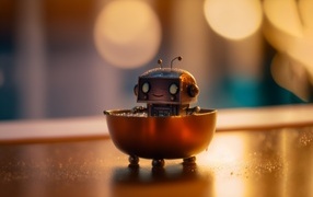Small robot figurine on the table