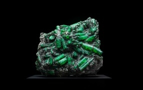 Beautiful green crystal on a black background