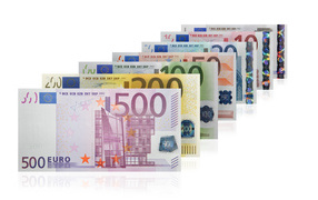 Different euro banknotes on a white background