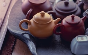 Clay teapots stand on the table