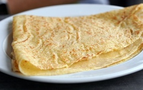 Thin fresh pancakes on a plate