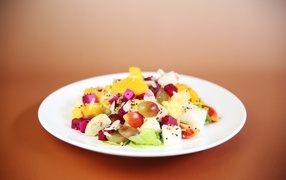 Vegetarian salad with cheese and grapes