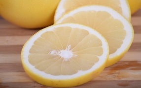 Sliced lemon on a wooden board