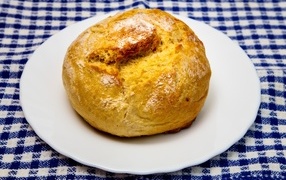 Fragrant baked bread on a white plate