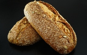 Two loaves of fresh bread with sesame seeds