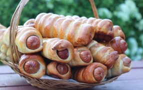 Beautiful aromatic sausages in dough
