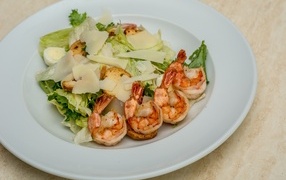 Shrimp on a plate with lettuce