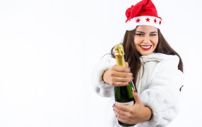 Girl with a bottle of champagne for the New Year