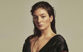 Girl model Lorde Vogue on a gray background