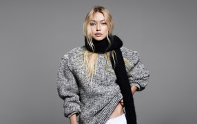 Model Gigi Hadid in a warm sweater with a black scarf