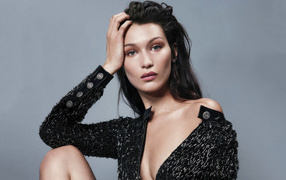 Pensive model Bella Hadid on a gray background