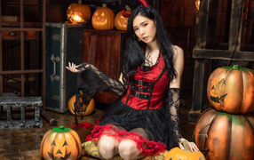 Милая девушка азиатка в костюме на Хэллоуин