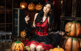 Девушка в красивом платье на Хэллоуин