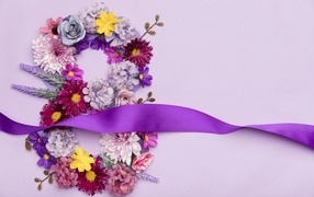 Number eight from flowers and a ribbon for International Women's Day