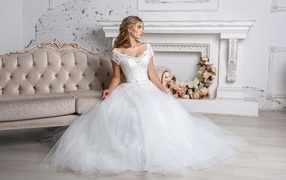 Bride girl in a lush white dress