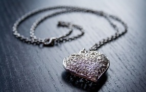 Beautiful silver pendant in the shape of a heart
