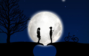 Couple in love near a tree against the backdrop of the moon