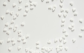 Small white hearts on a gray background