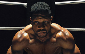 Актер Майкл Бака́ри Джо́рдан в фильме Крид 3