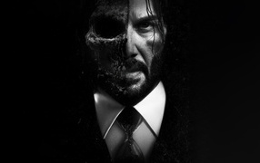 Персонаж фильма Джон Уик с испорченным лицом