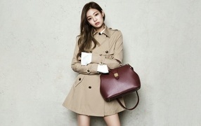 Beautiful girl singer Kim Jennie with a bag